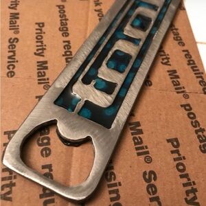 One of a Kind Tool 10,000 Days Metal Bottle Opener with Blue Accents